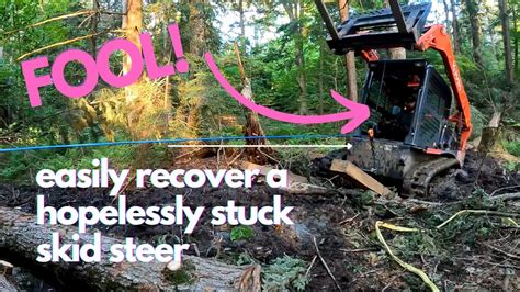 how to get a skid steer out of mud|skid steer recovery.